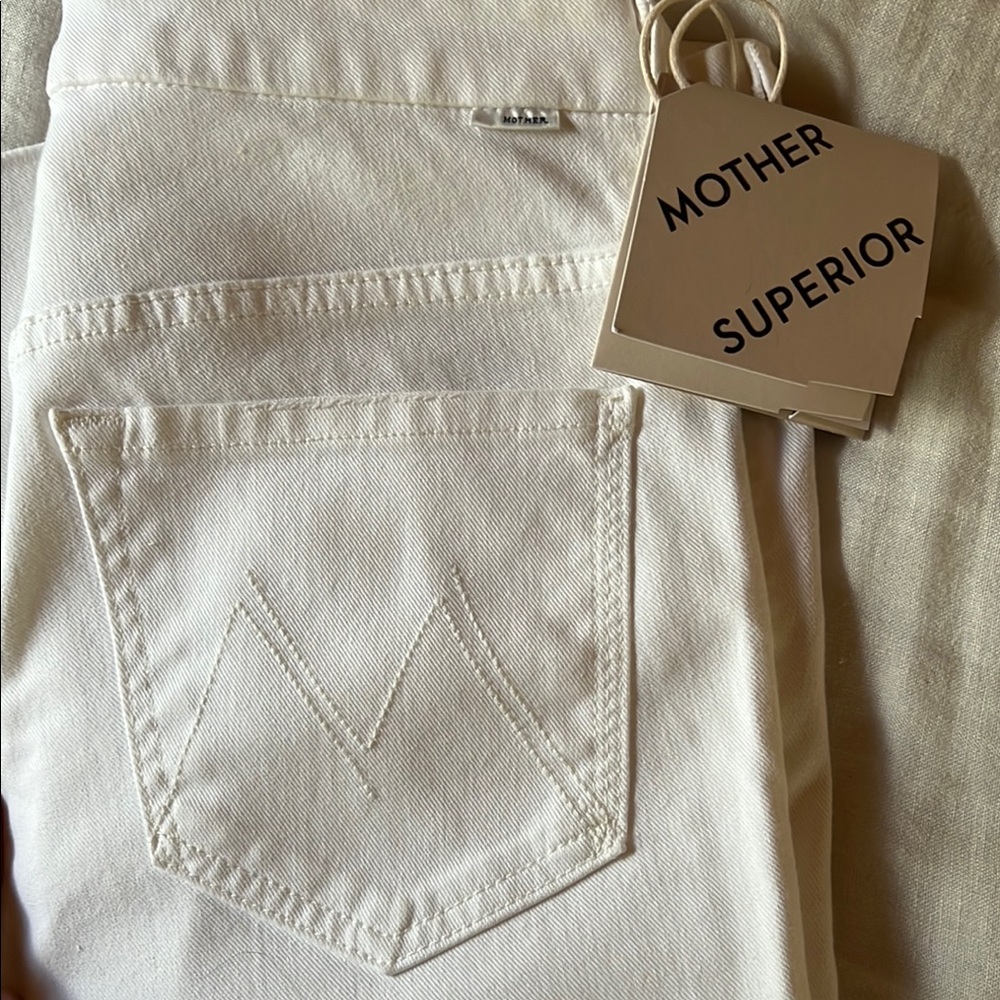 Mother brand new never worn jeans.  High waisted looker ankle fray. Color white